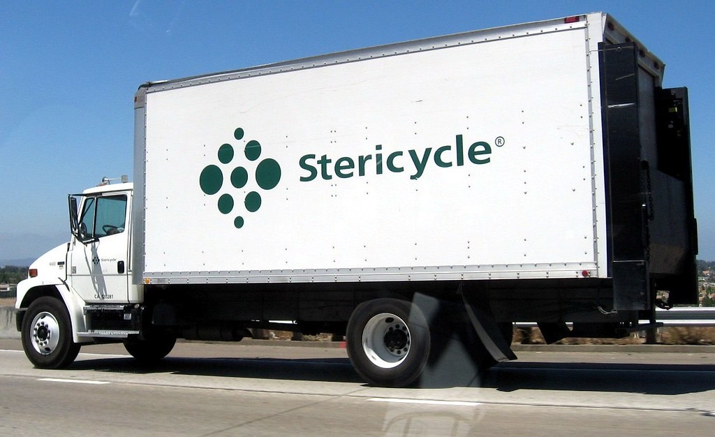 Stericycle logo on side of white large truck